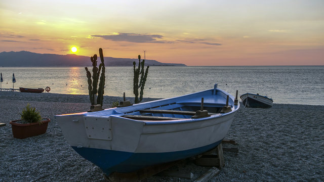 barche, cactus, spiaggia e mare