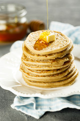 Pancakes with butter and honey