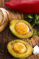 Homemade Organic Egg Baked in Avocado with Salt and Pepper