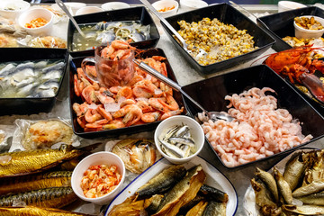 Fresh seafood displayed on ice in a local restaurant at Southwold Harbour, UK