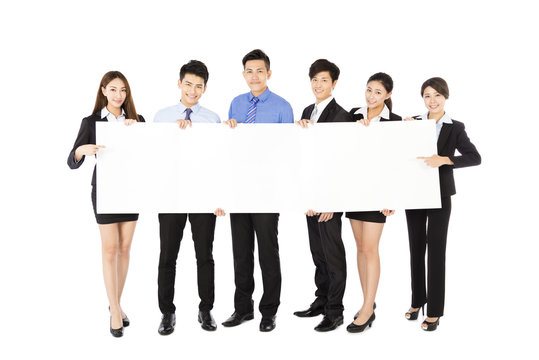 young Business  group holding  blank white  board