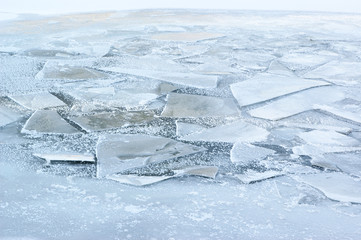 Fototapeta na wymiar Winter frozen river or lake background