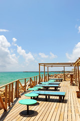 terrace bar on the shore of beach, island of Culatra, Algarve, southern Portugal, Europe