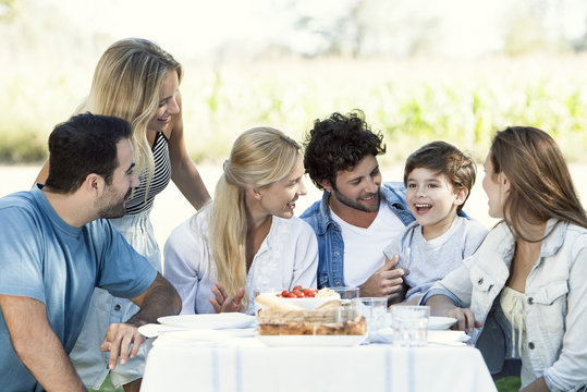 Family and friends spending time together outdoors