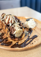 Nutella Puff Parfait banana with chocolate on wooden tray