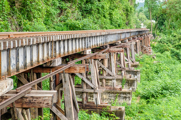 Fototapeta premium Death railway train wooden structure history of world war II in river kwai in kanchanaburi,thailand