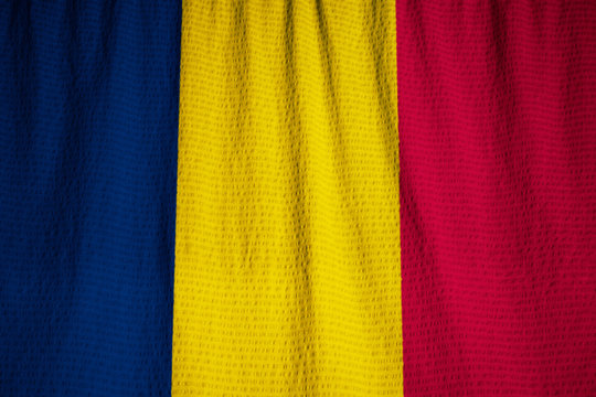 Closeup of Ruffled Chad Flag, Chad Flag Blowing in Wind