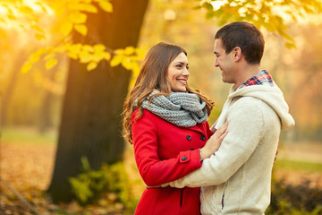 Fototapeta premium Cheerful couple in love in park