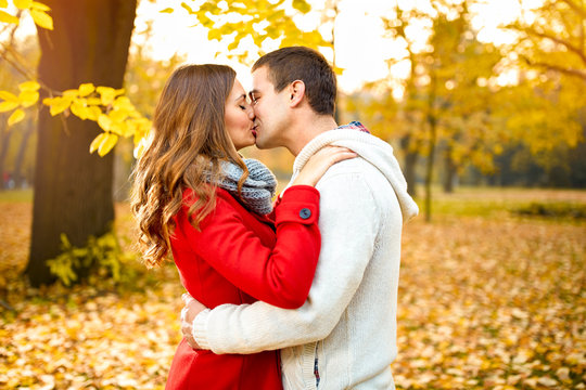 Couple kissing in park