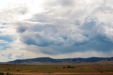 cirrus clouds on a colorful sky during sunset. photo toned 