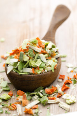 Dried vegetable spice. Bio herbs product. Finely chopped herbs.