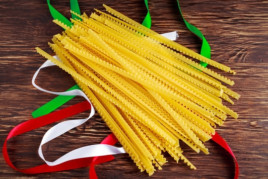 Uncooked Authenric Tripoline spaghetti pasta with italian flag style ribbons