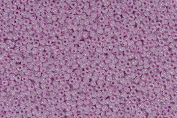 Light lilac beads. Texture.