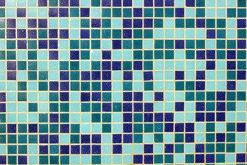 Fototapeta premium Blue ceramic mosaic background. Closeup