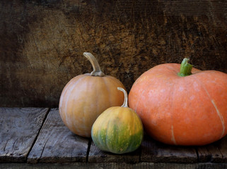 pumpkin on wooden background. Rustic photo