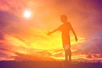 Silhouette alone girl at sky sunset