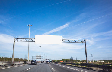 White information banner over traffic lanes - obrazy, fototapety, plakaty