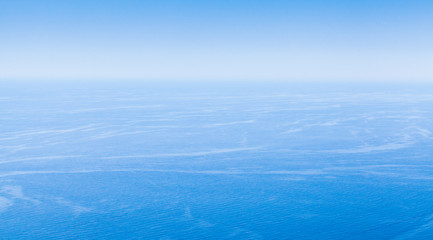 Fototapeta na wymiar Empty seascape with clear blue sky