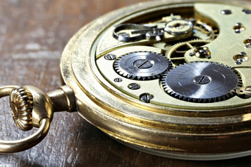 clockwork of an antique Swiss 14k gold pocket watch