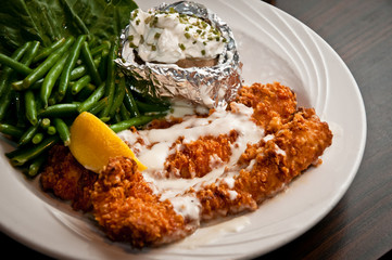 Ferebee's Restaurant, Tappahannock, VA. Pamagean crusted rockfish with potato and green beans.