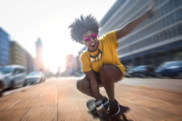 Skater girl going fast in the street