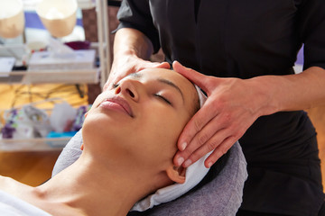 Fototapeta na wymiar Head massage woman with physiotherapist