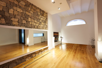 Gym indoor with wooden floor and mirror