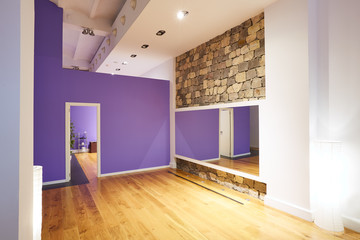 Gym indoor with wooden floor and mirror