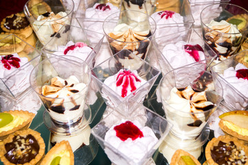 Cake, desserts, homemade pastries in the foreground