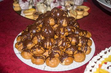 Cake, desserts, homemade pastries in the foreground