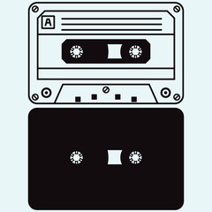 Cassette tape. Isolated on blue background. Vector silhouettes