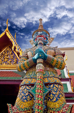 Giant demon guarding an exit to Wat Phra Kaew in Bangkok, Thailand.