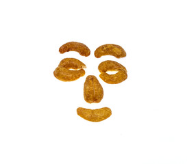 Salted and roasted Cashews nuts is snack.Isolate cartoon face.