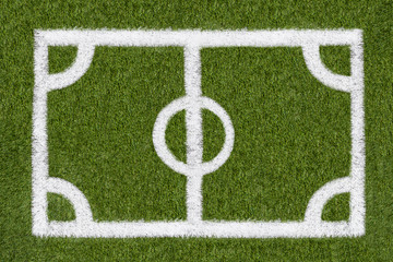 Closeup image of natural green grass soccer field