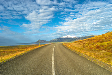 Isolated road and Icelandic colorful landscape at Iceland, summe