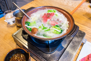 Shabu Shabu hot pot with raw meat