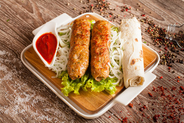 lula kebab on a wooden board 3
