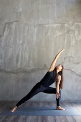  Woman practicing yoga in various poses © SianStock