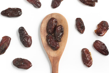 Dried Dates into a spoon. Tamara