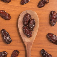 Dried Dates into a spoon. Tamara