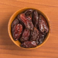 Dried Dates into a bowl. Tamara