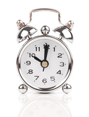 metal clock on a white background