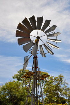 Old Rural Iron windmill with direction tail 