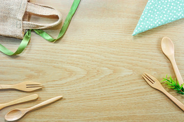 Fototapeta na wymiar Cooking utensils on wooden table. Top view with copy space