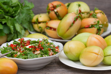 Green tomatoes stuffed with pepper and herbs.