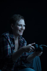 female gamer with wired controller
