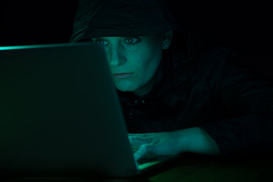 female Hacker on Computer 1