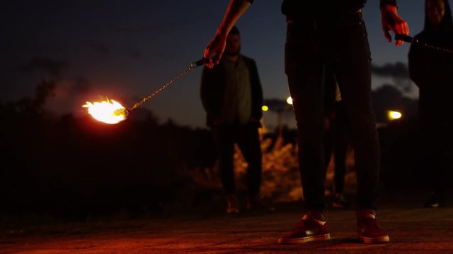 Male Artist Performing Fire Show Outdoors at Evening Time. Shot on RED Cinema Camera in 4K (UHD).