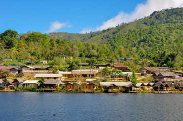 Fototapeta na wymiar Thai Hill tribe people's village beside a lake in northern Thailand