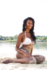 beautiful girl sitting on the beach